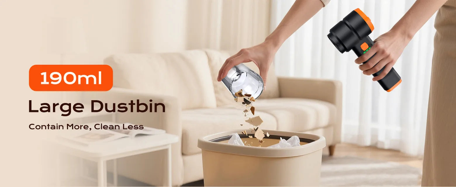 Black cordless car vacuum with a removable 190 ml dustbin being emptied into a trash bin