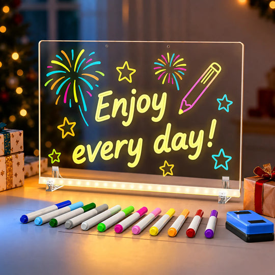 White EHINI LED drawing board for kids displaying colorful fireworks and stars with 12 fluorescent markers in a festive tabletop setting