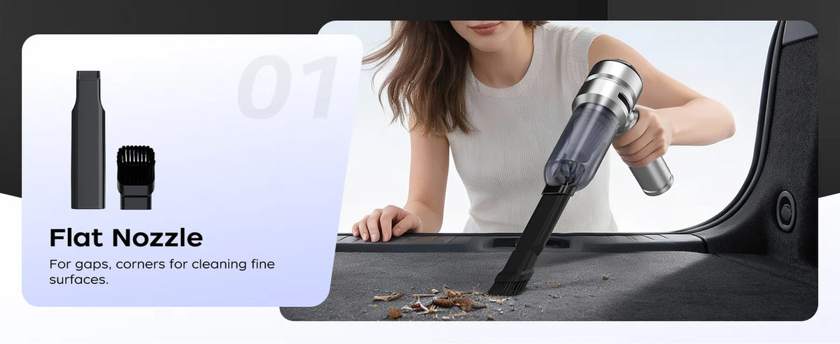 Silver VNOST cordless car vacuum cleaning debris from a car trunk with a flat nozzle and brush attachment