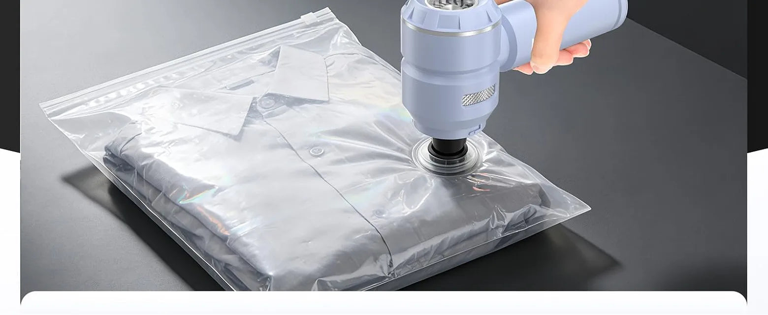 Blue VNOST cordless car vacuum extracting air from a vacuum storage bag