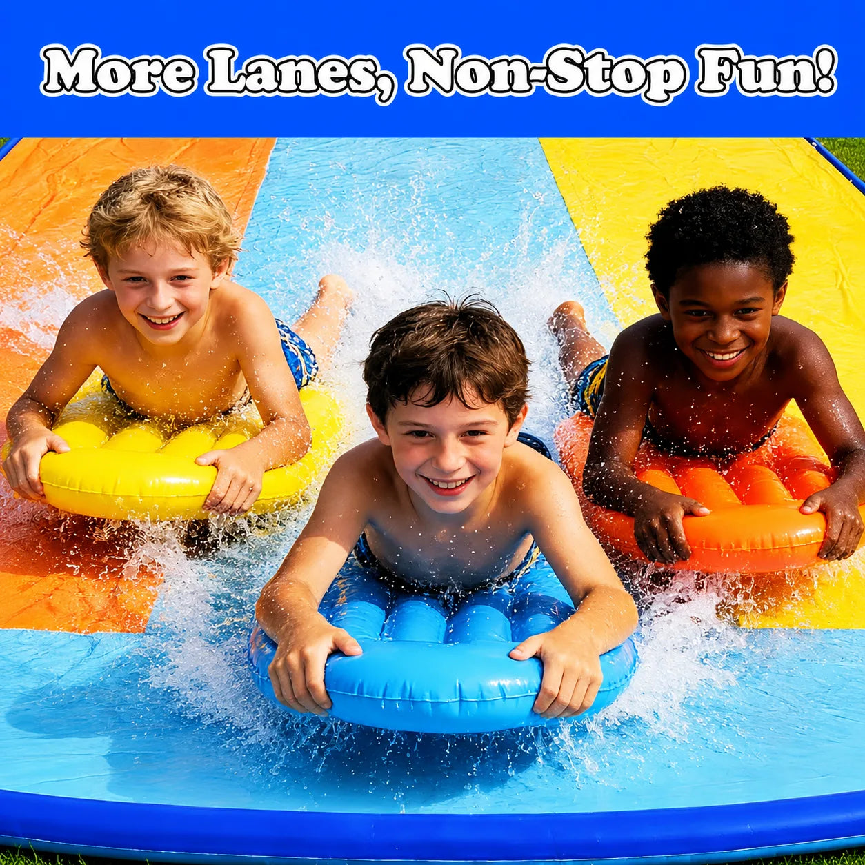 Three children racing on colorful bodyboards across a three-lane backyard slip and slide