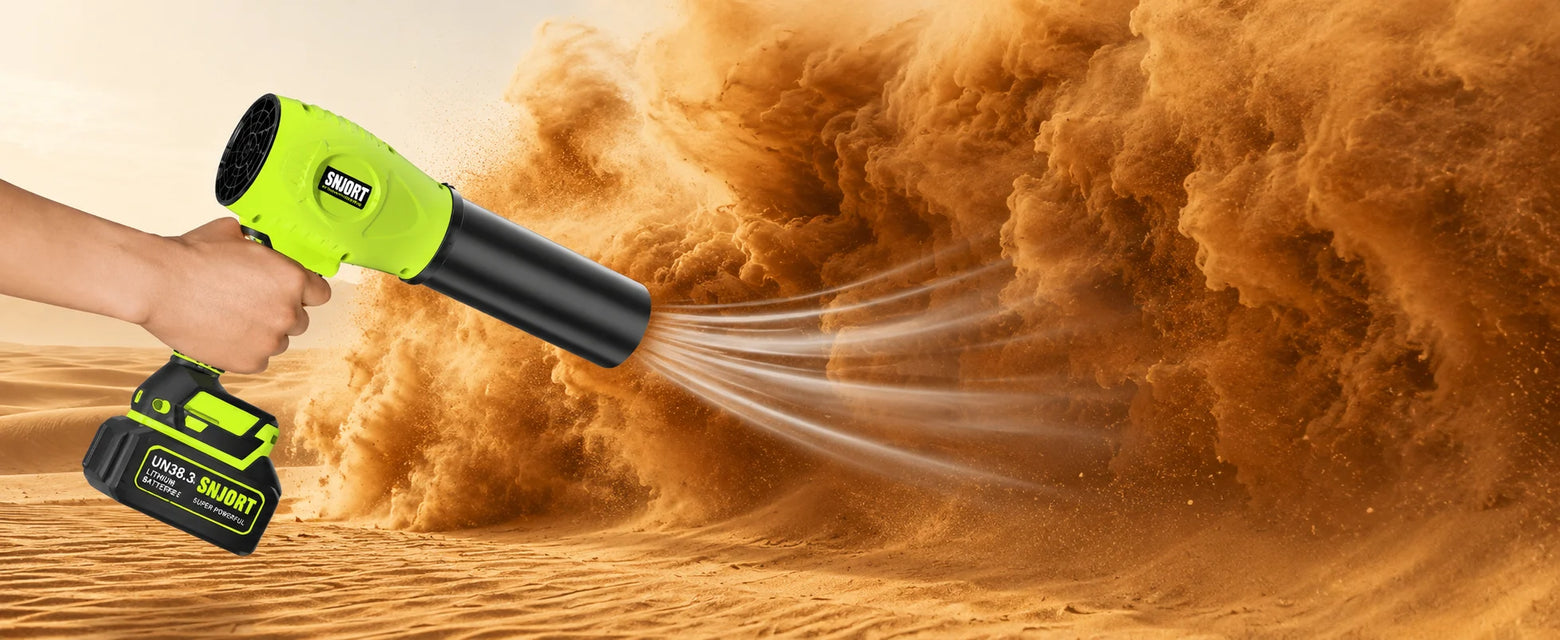 SNJORT green cordless leaf blower shown blowing dust with extended nozzle in an outdoor scene